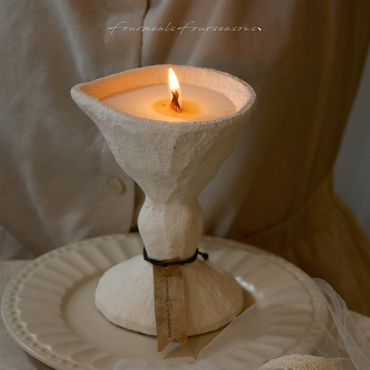 Sculptural candle styled as artistic home decor