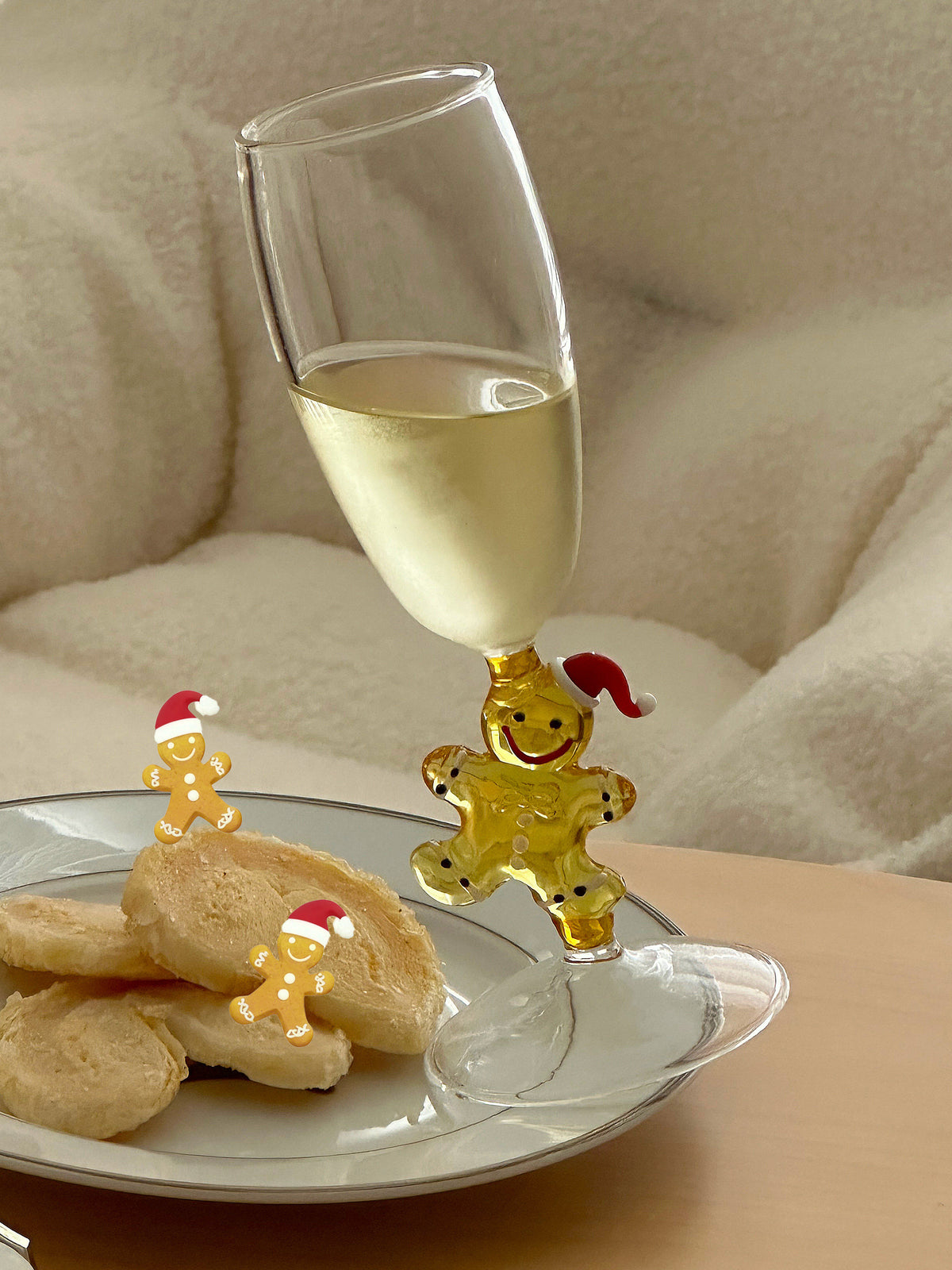 Gingerbread champagne glass gift set shown in warm light