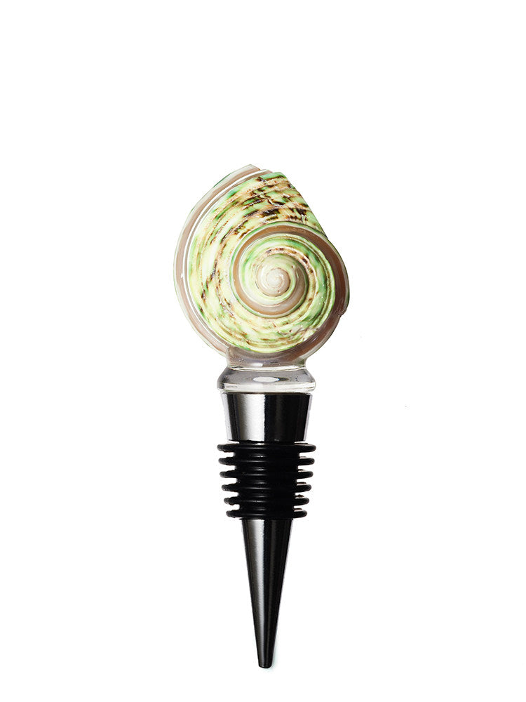 Green spiral seashell wine stopper on a white background
