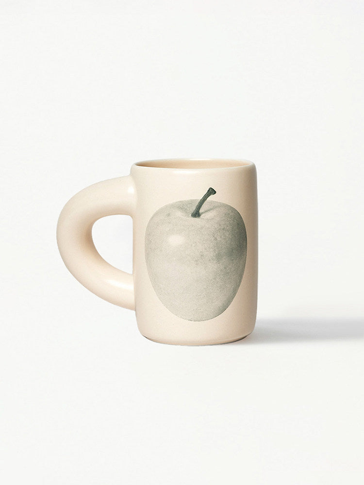SoftServe pale pear thick-handle ceramic mug on a white background