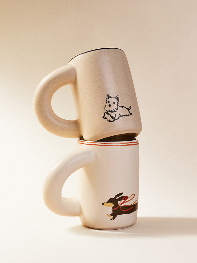 Two stacked SoftServe thick-handle ceramic mugs on a neutral background