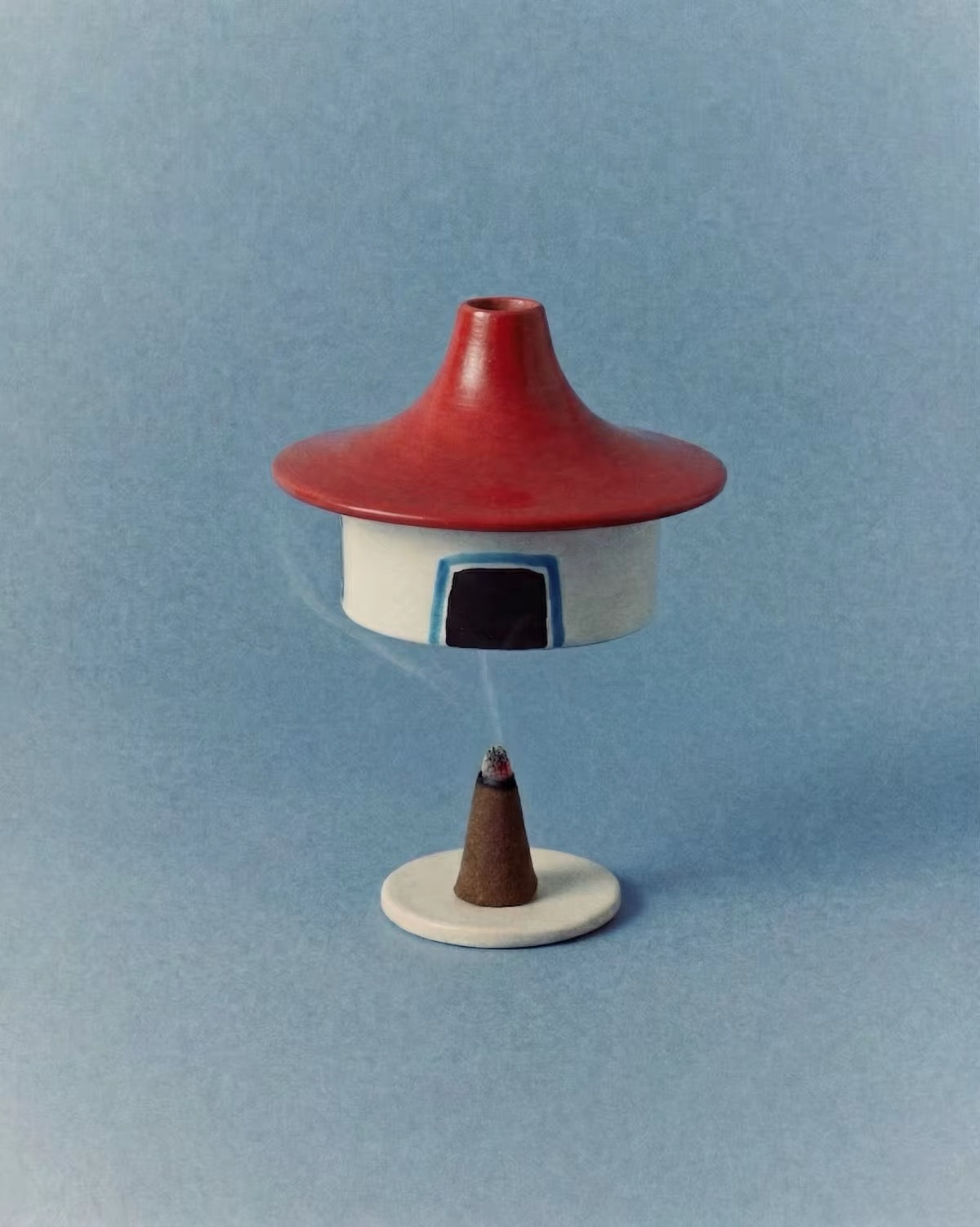 Childish Play red roof cottage incense burner shown from another angle