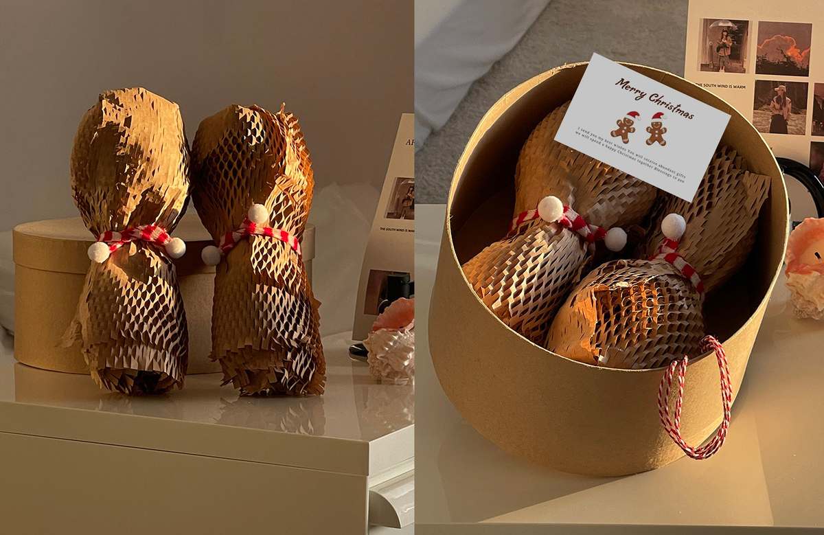 Two Shinymomo gingerbread champagne glasses shown in protective gift packaging