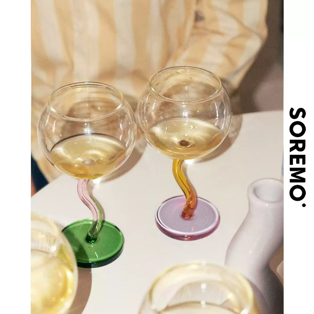 Close view of two SOREMO Bubble goblets with wavy stems