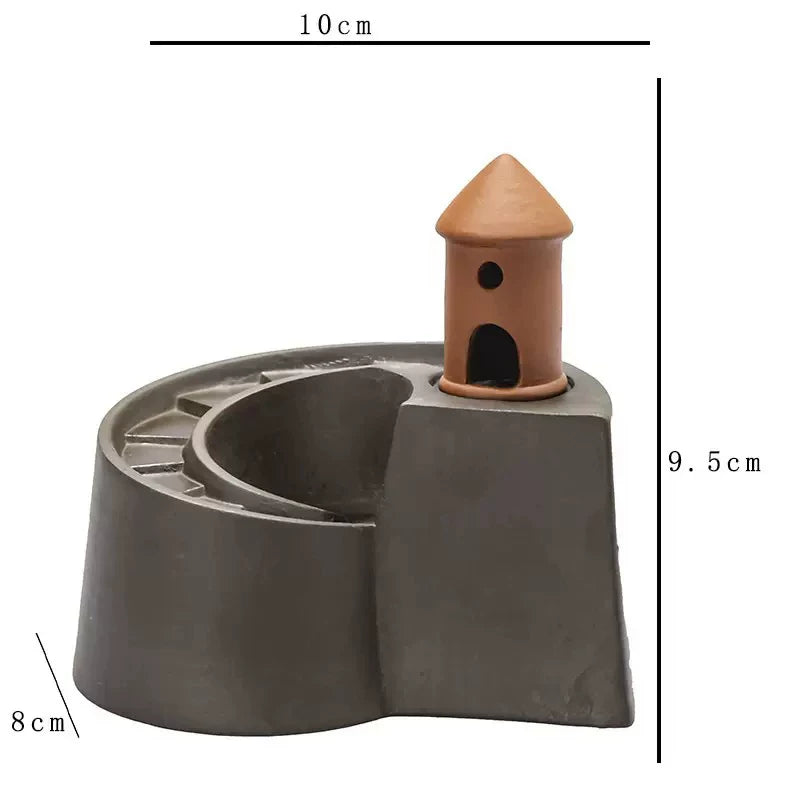 Sculptural lighthouse backflow incense burner
