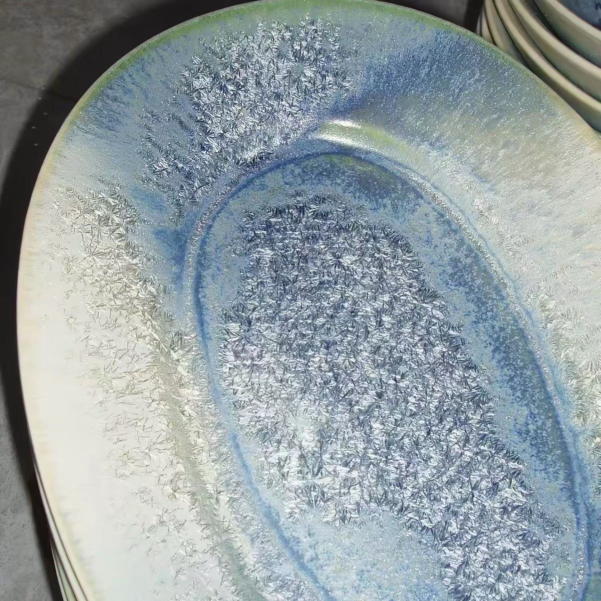 Close detail of PiGoo Brunch Plate crystalline kiln glaze
