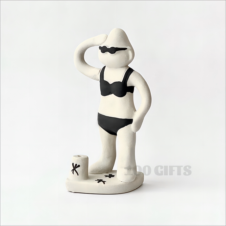 Bikini Surfer sculptural incense holder by Walala